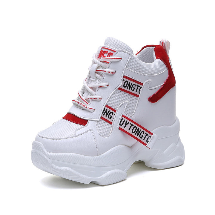 Women’s ankle-high platform leisure shoe with hidden wedge heel and distinctive decorative straps Mune Fashion