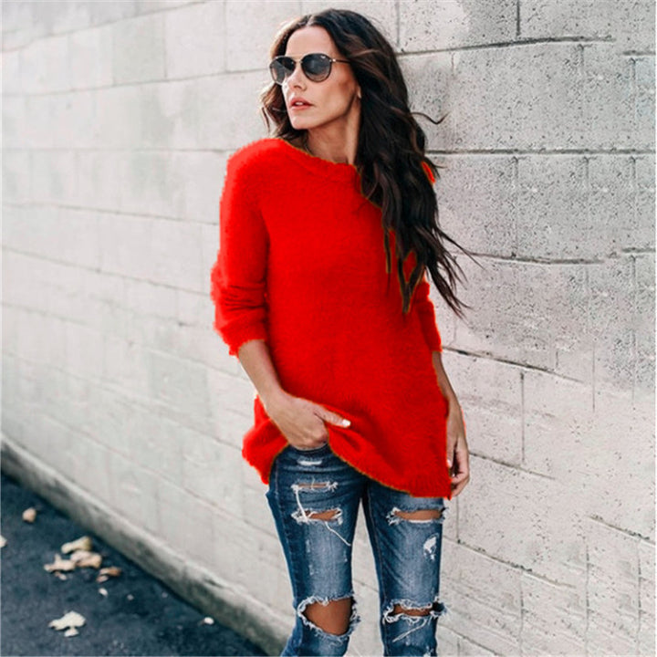 Women's cozy oversized knit sweater with round neckline, high-low hem, and side slits Mune Fashion