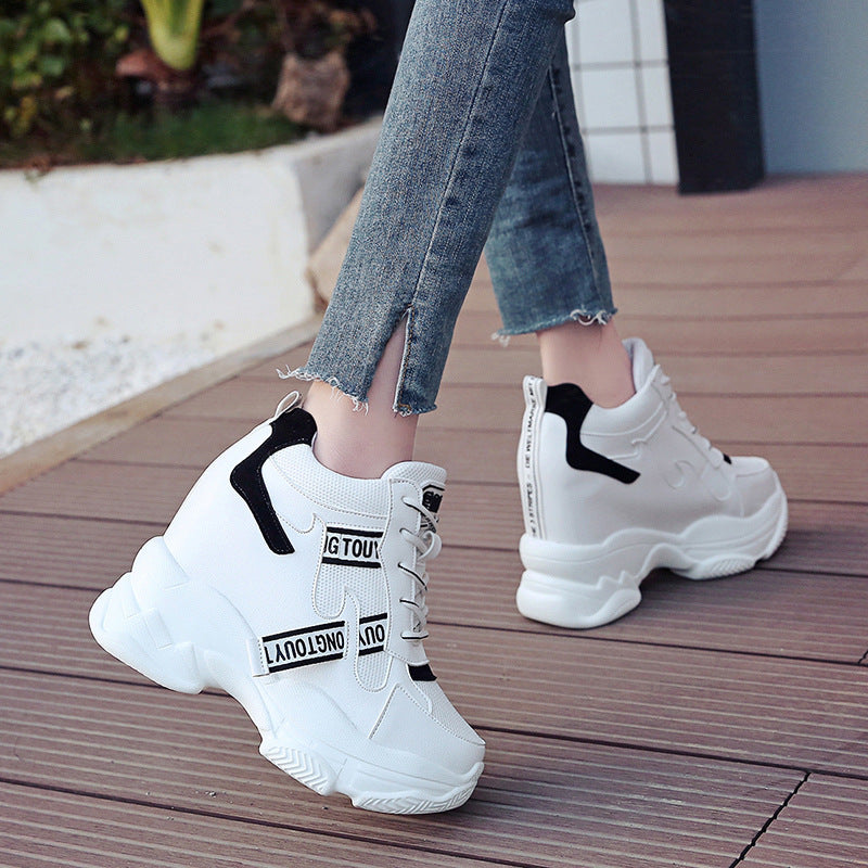 Women’s ankle-high platform leisure shoe with hidden wedge heel and distinctive decorative straps Mune Fashion