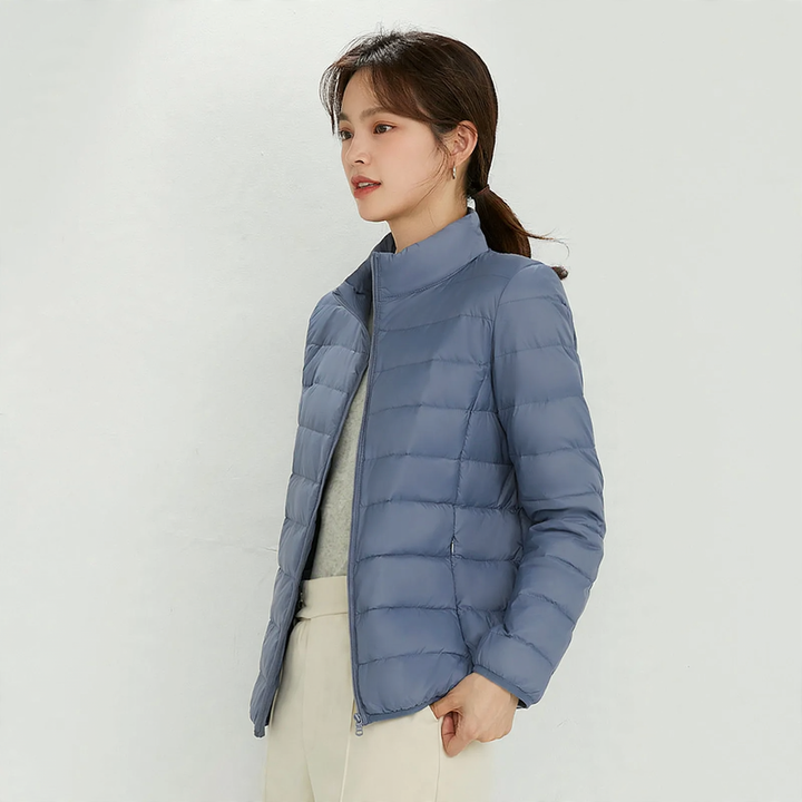 Light women's down jacket with stand-up collar, white duck down