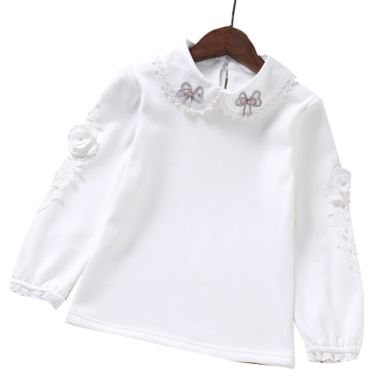Girls elegant long sleeve blouse with ruffle details and floral accent Mune Fashion