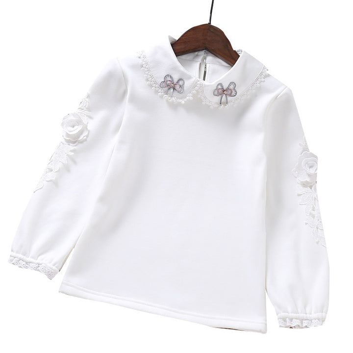 Girls elegant long sleeve blouse with ruffle details and floral accent Mune Fashion