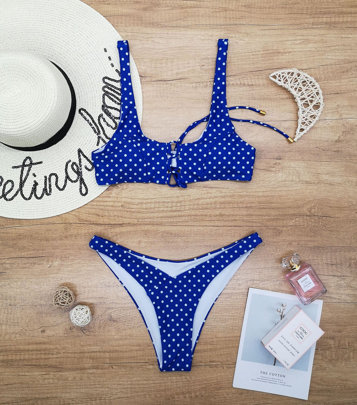 Women's triangle bikini with playful polka dot design and adjustable strap system Mune Fashion
