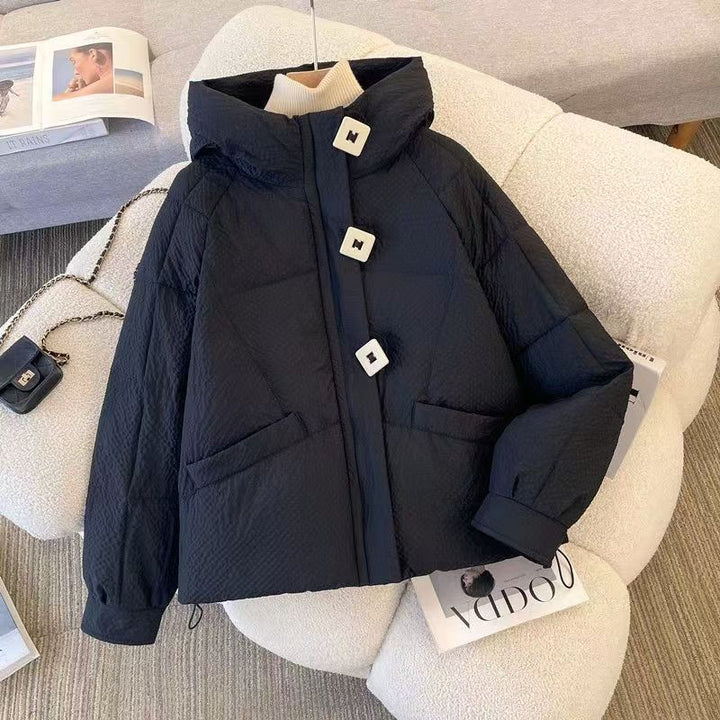Short women's quilted jacket with hood, loose fit