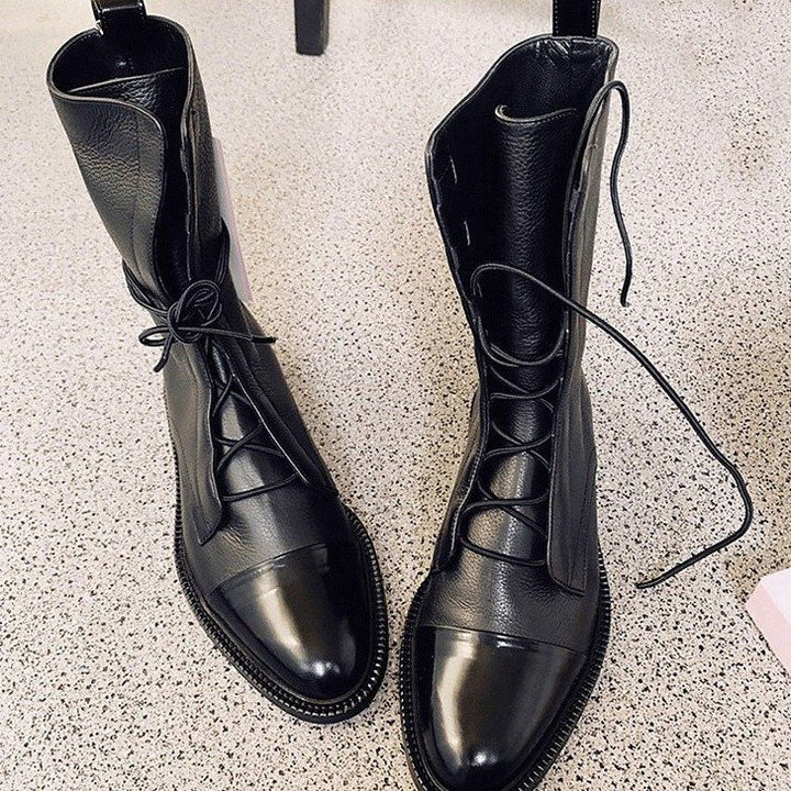 Women's elegant lace-up boots with cap toes, decorated lacing detail, and practical pull loops Mune Fashion