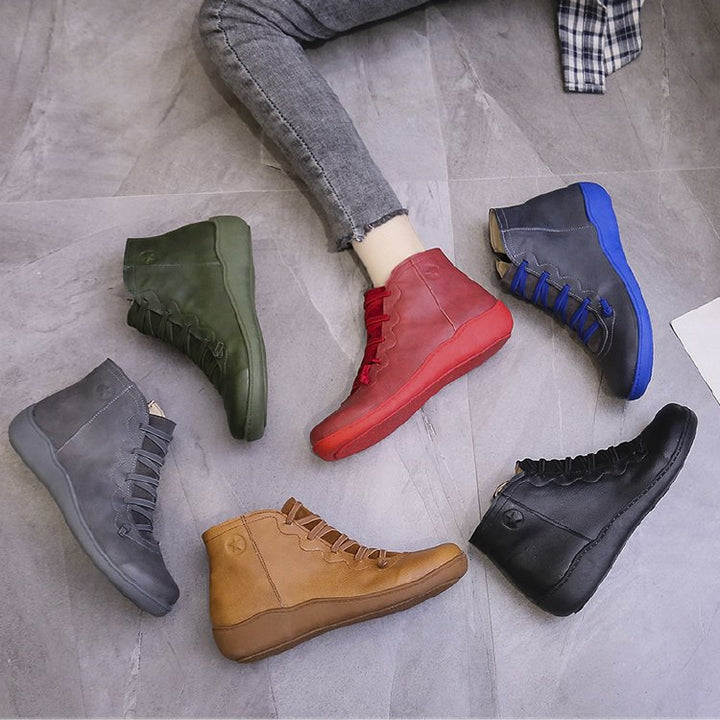 Women's ankle-high lace-up boot with side zipper, soft leatherette, padded comfort footbed, and flexible lightweight sole Mune Fashion