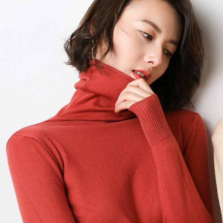 Women's knitted pullover with stand collar and geometric pattern