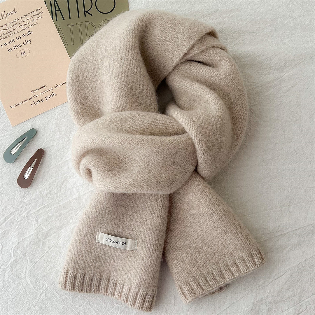 Simple knitted scarf made of pure wool