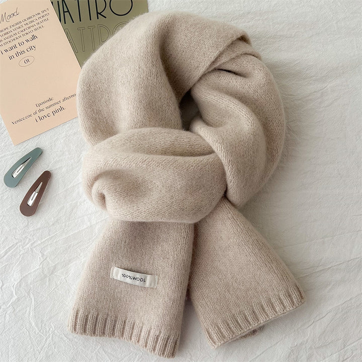 Simple knitted scarf made of pure wool
