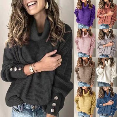 Women's chunky knit turtleneck sweater with decorative button sleeves and relaxed oversized fit Mune Fashion