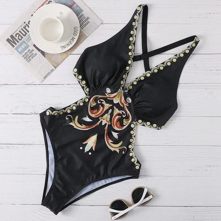 Ladies one-piece swimsuit with intricate design and adjustable straps Mune Fashion