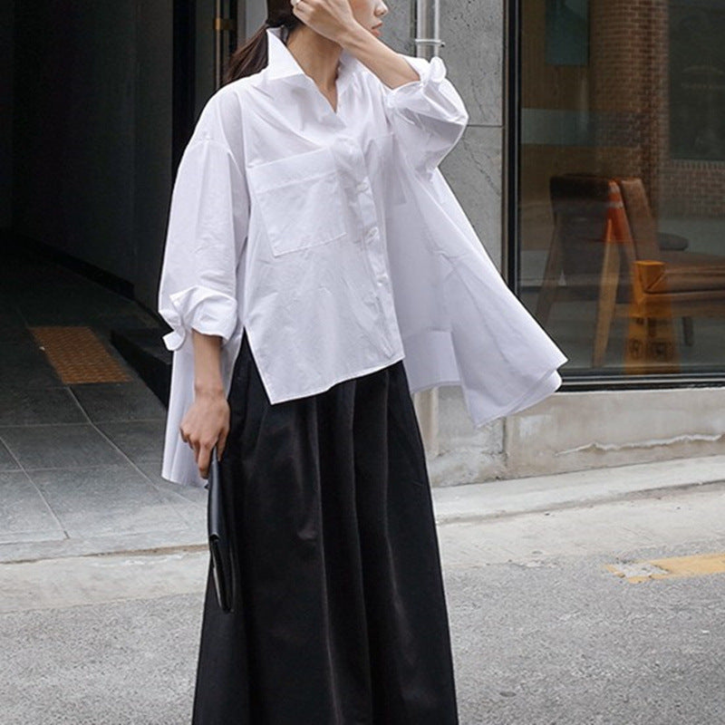 Women's oversized boxy shirt blouse made of cotton poplin with large chest pockets and side bow detail Mune Fashion