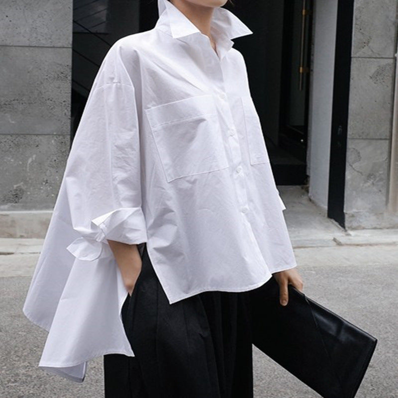 Women's oversized boxy shirt blouse made of cotton poplin with large chest pockets and side bow detail Mune Fashion