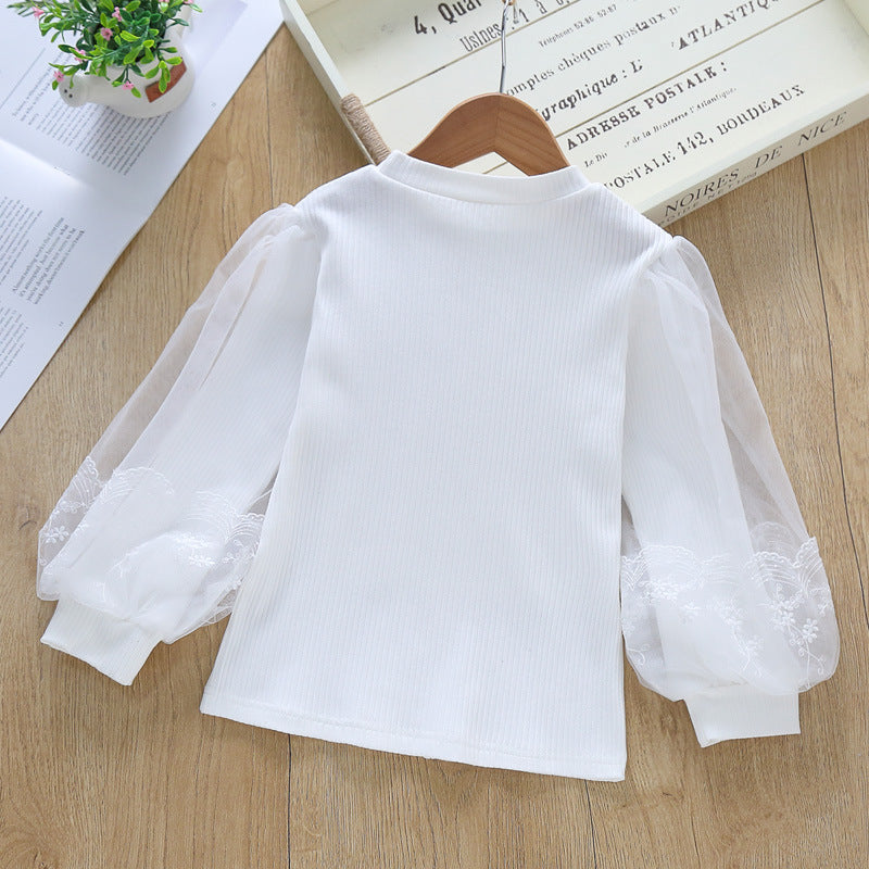 Women's blouse with transparent tulle sleeves and fine embroidery Mune Fashion