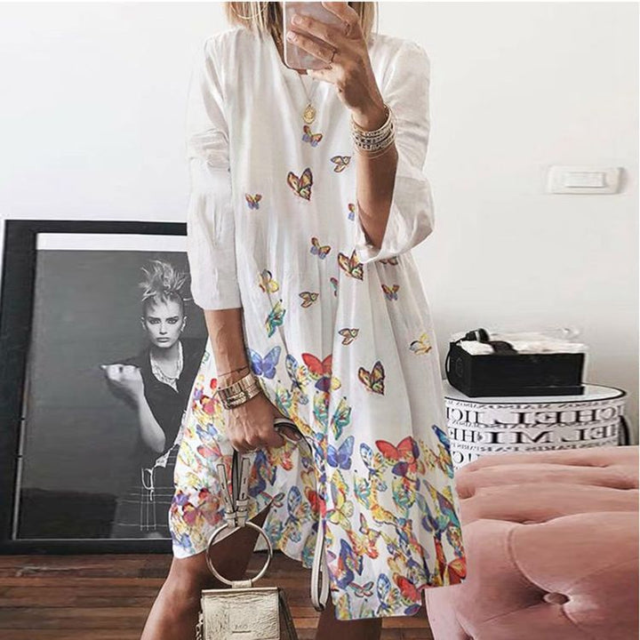 Women's airy midi dress with palm print, half-length sleeves and A-line cut Mune Fashion