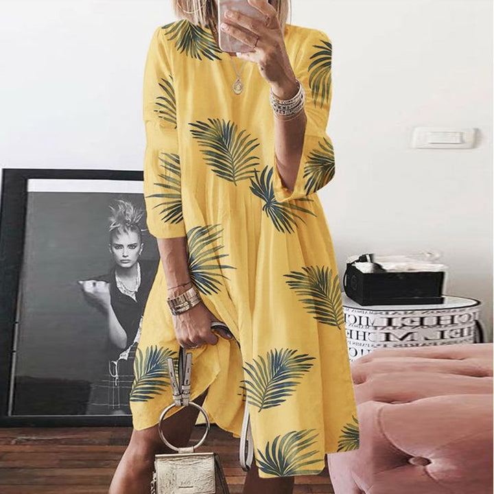 Women's airy midi dress with palm print, half-length sleeves and A-line cut Mune Fashion
