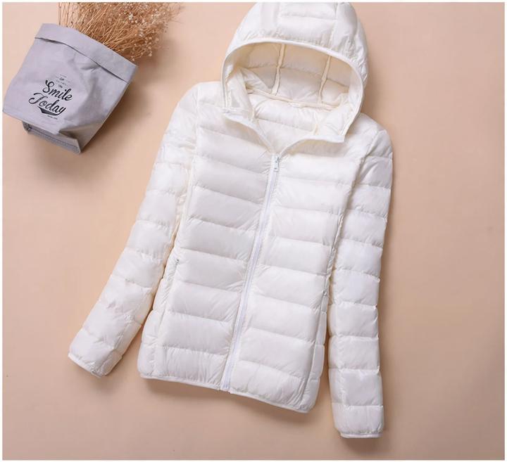 Light women's down jacket, short, with white duck down