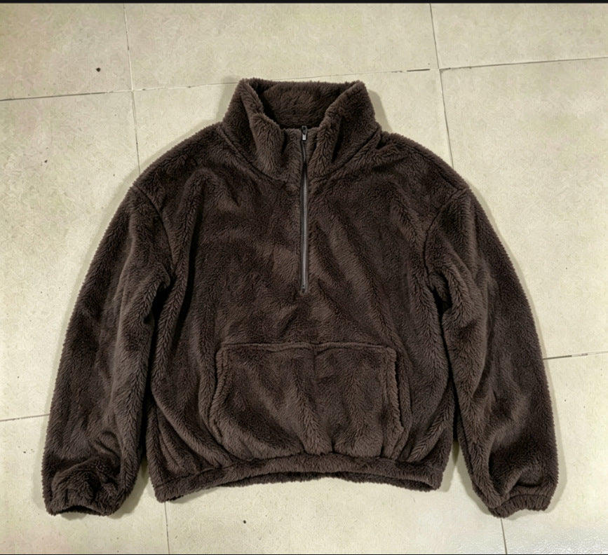 Padded women's sweater with standing collar and zipper