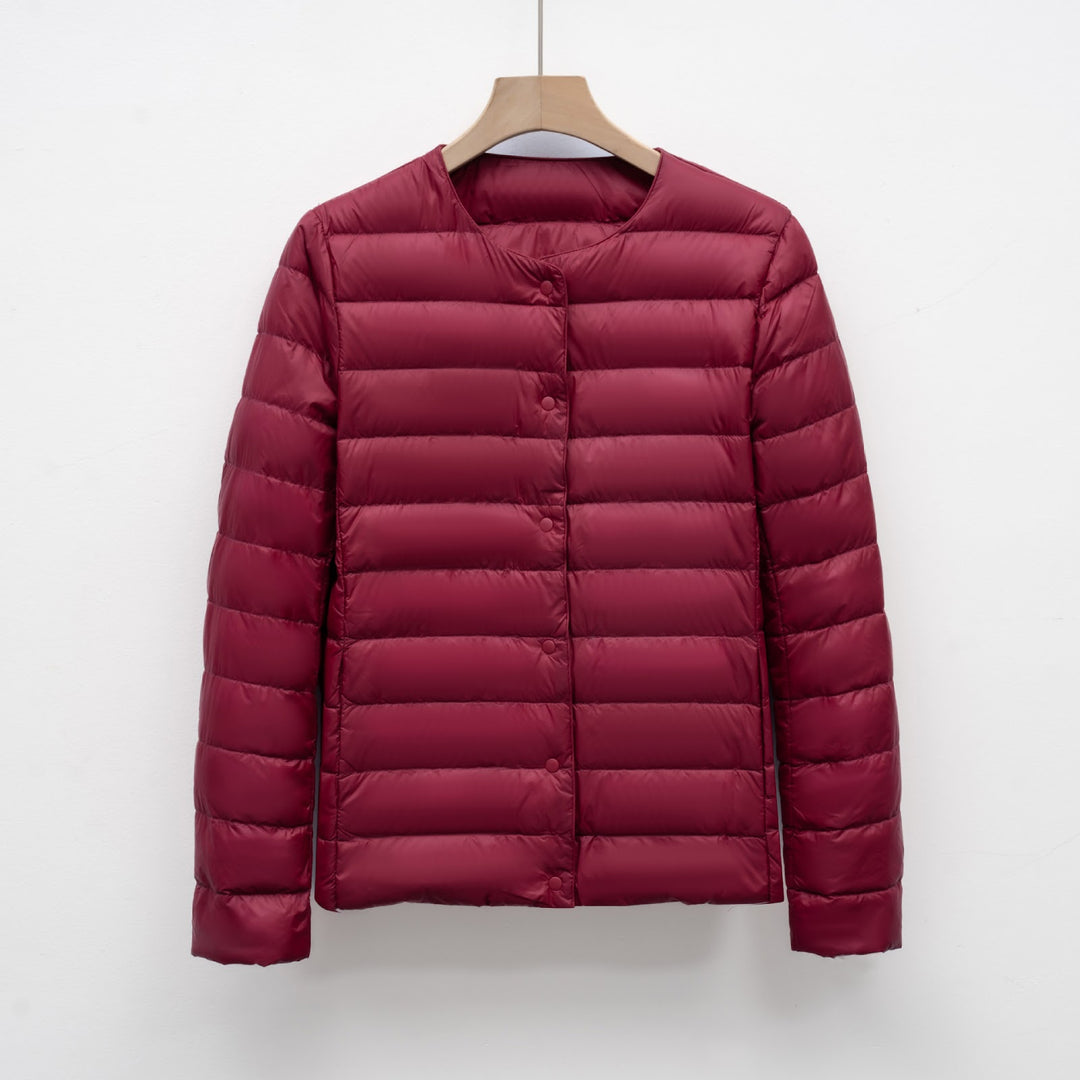 Light women's quilted jacket with round neckline
