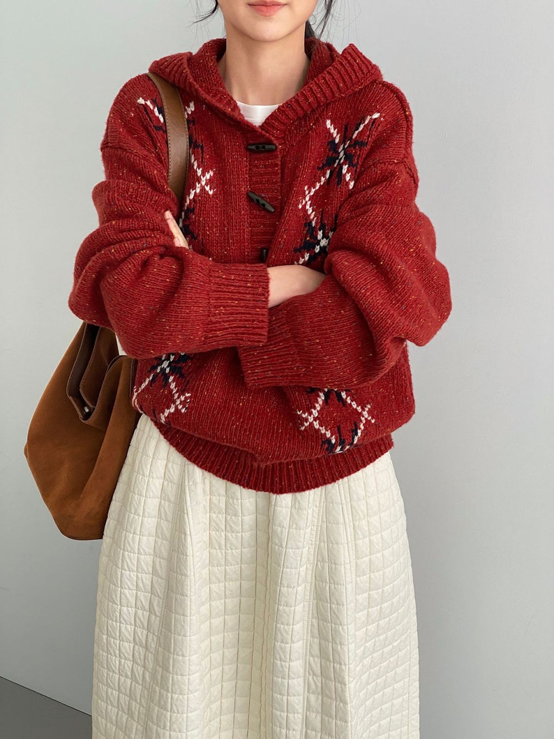 Hooded pullover with snowflake pattern, knitted