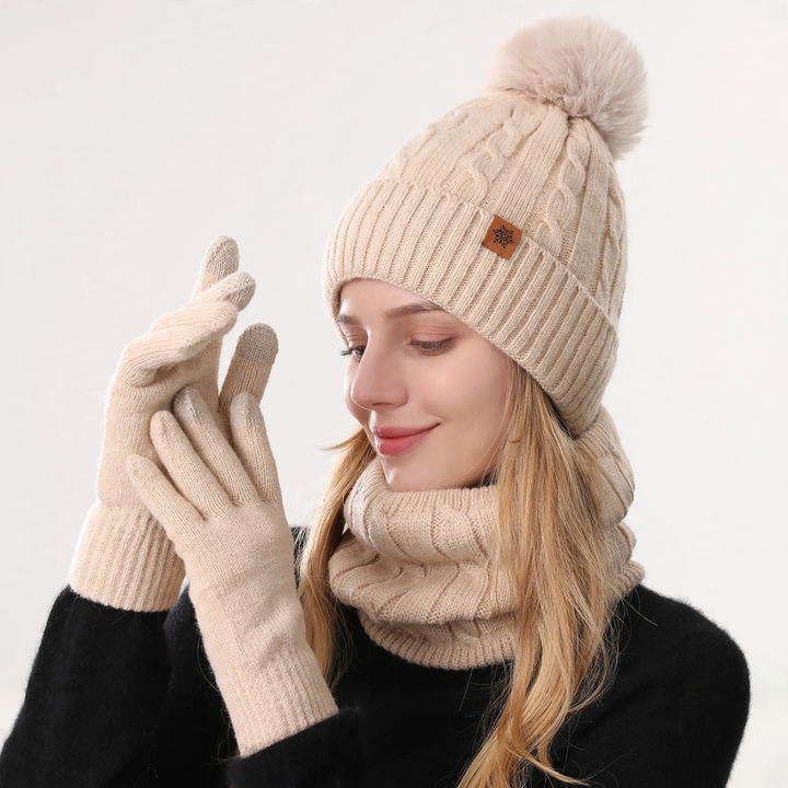 Winter set consisting of knitted hat, scarf, and gloves