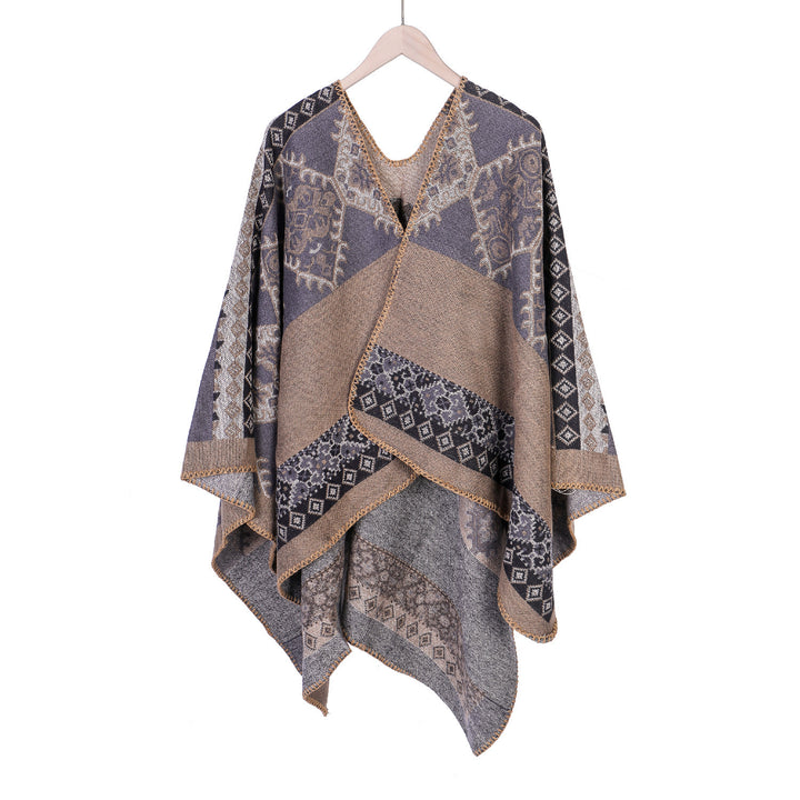 Women's Oversize Ruana Poncho made of jacquard fabric with asymmetrical pointed edge and ornamental border Mune Fashion
