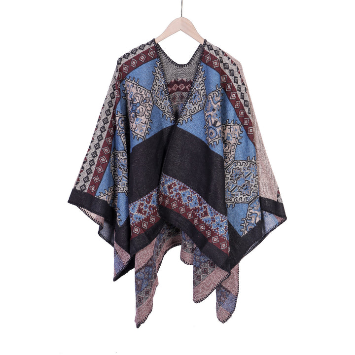 Women's Oversize Ruana Poncho made of jacquard fabric with asymmetrical pointed edge and ornamental border Mune Fashion