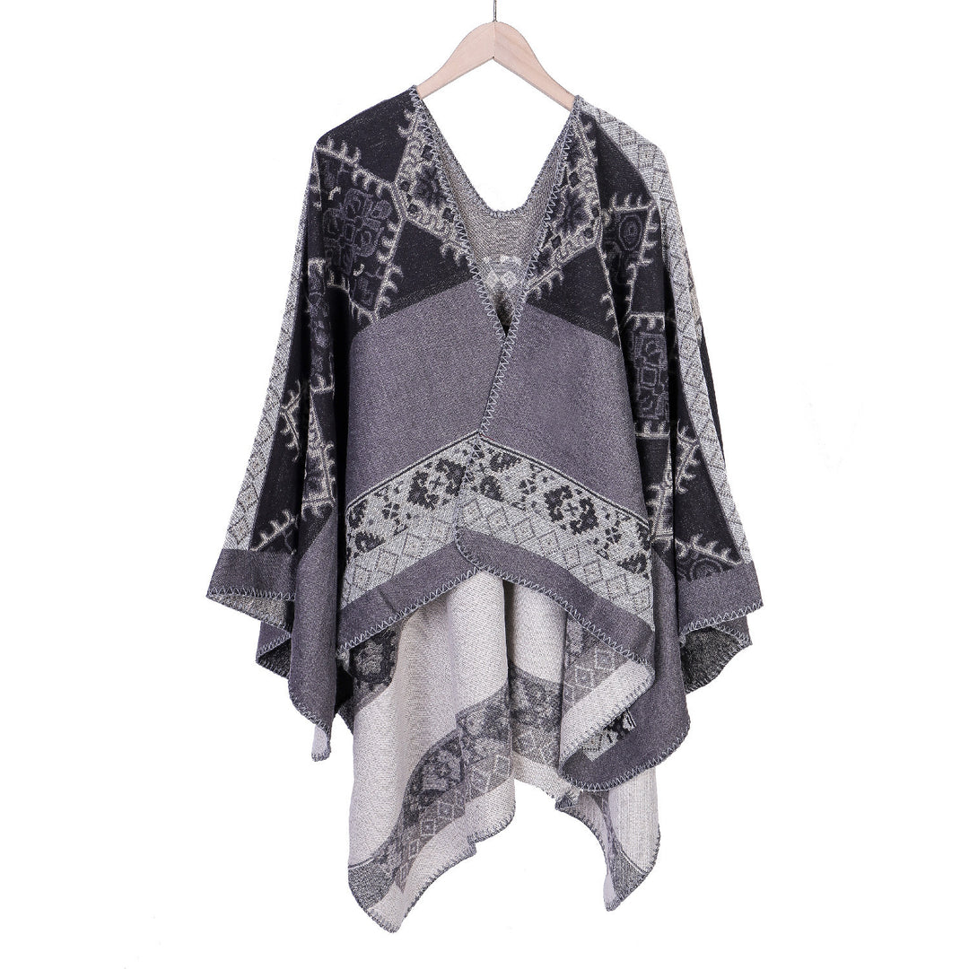 Women's Oversize Ruana Poncho made of jacquard fabric with asymmetrical pointed edge and ornamental border Mune Fashion