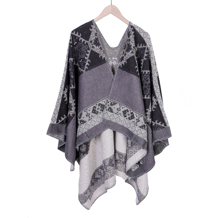 Women's Oversize Ruana Poncho made of jacquard fabric with asymmetrical pointed edge and ornamental border Mune Fashion