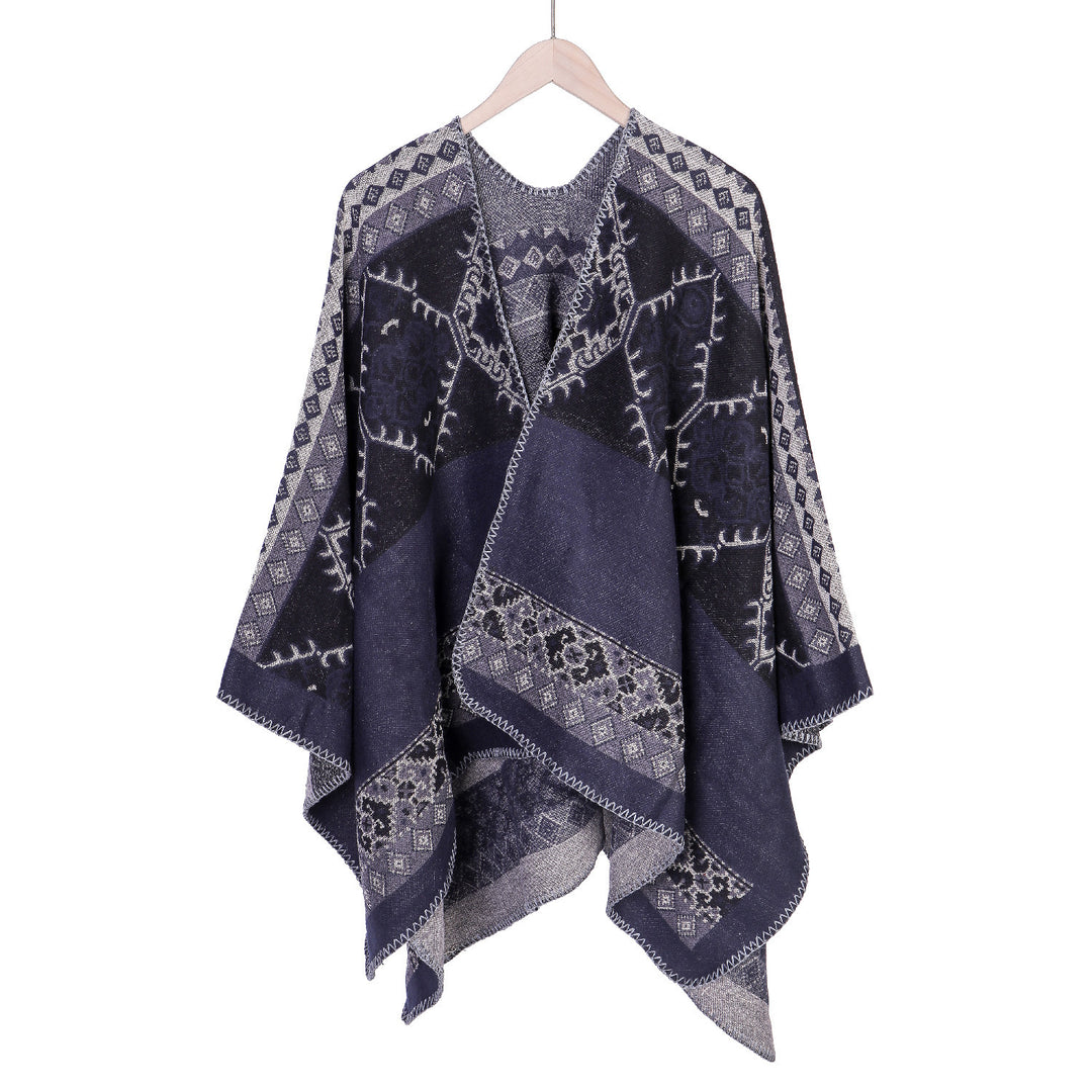 Women's Oversize Ruana Poncho made of jacquard fabric with asymmetrical pointed edge and ornamental border Mune Fashion