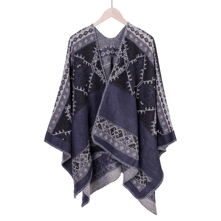 Women's Oversize Ruana Poncho made of jacquard fabric with asymmetrical pointed edge and ornamental border Mune Fashion