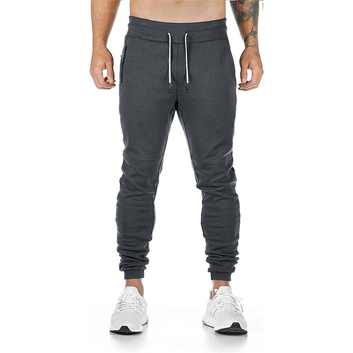 Men's tailored tapered joggers with elastic drawstring, cuffs, and zippered pockets Mune Fashion