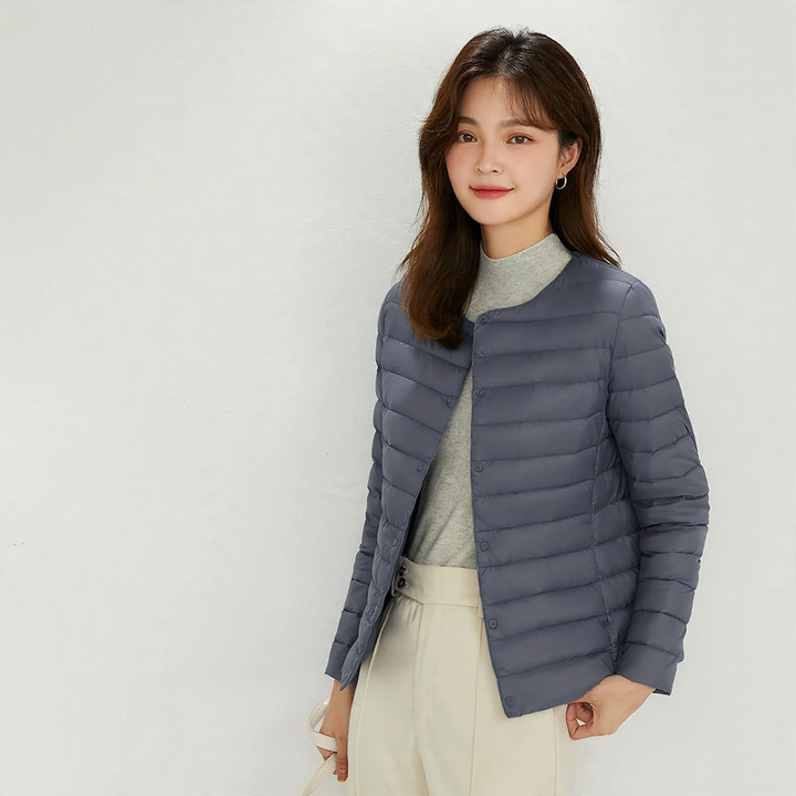 Light women's down jacket with 90% white duck down filling