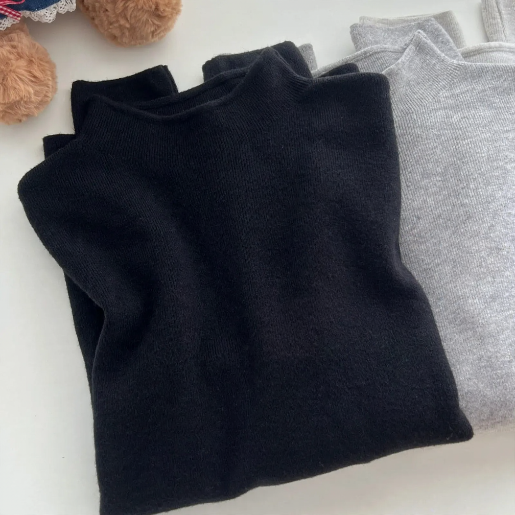 Women's knit sweater with stand-up collar, solid color