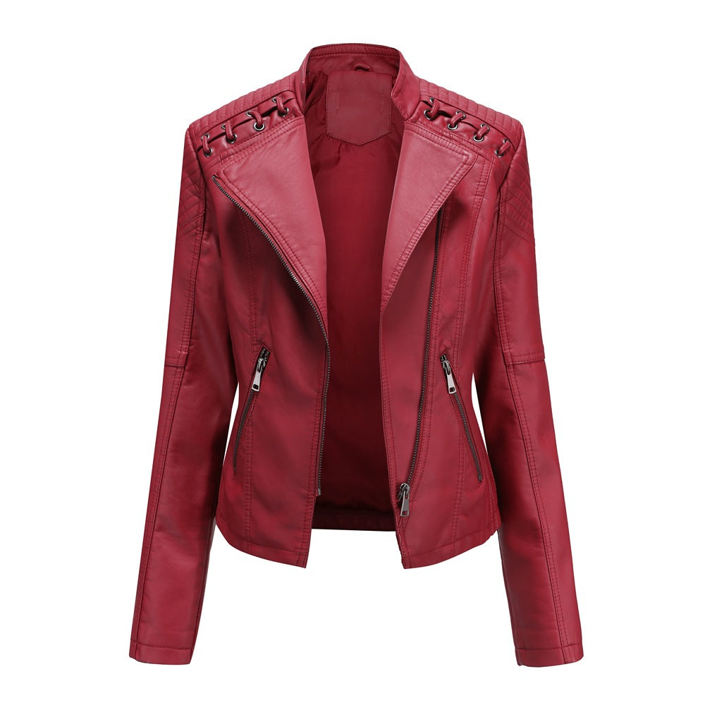 Women's short biker jacket made of faux leather with decorative eyelet lacing on the shoulders Mune Fashion