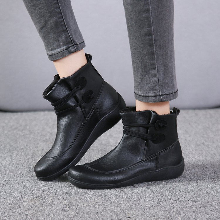 Women's faux-fur-lined ankle boot with ergonomic wedge sole, soft inner lining and decorative loops Mune Fashion