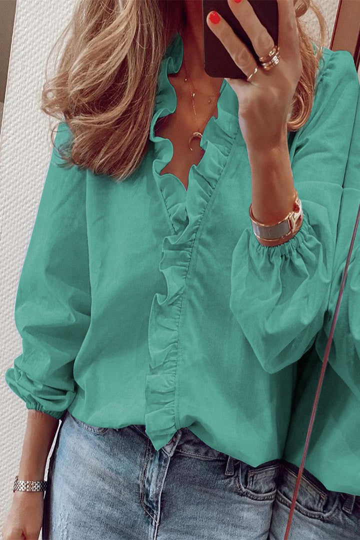 Blouse with long sleeves V-neck and ruffles