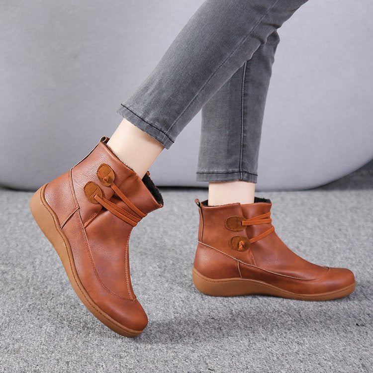 Women's faux-fur-lined ankle boot with ergonomic wedge sole, soft inner lining and decorative loops Mune Fashion