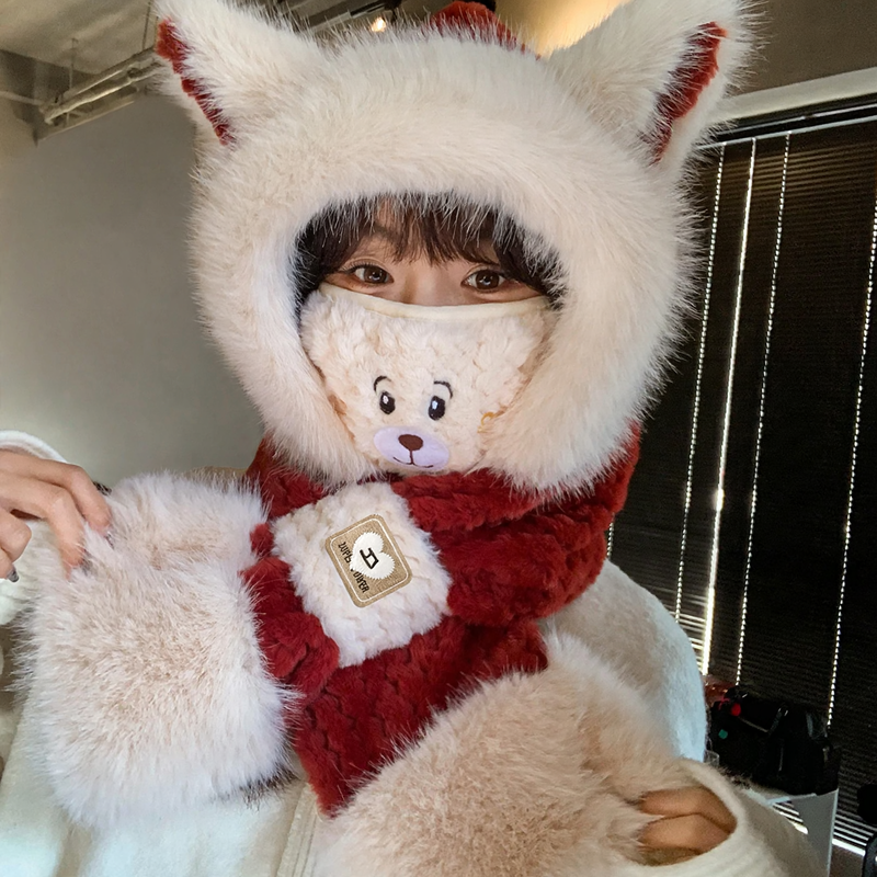 Fluffy set consisting of hat with fox ears and scarf