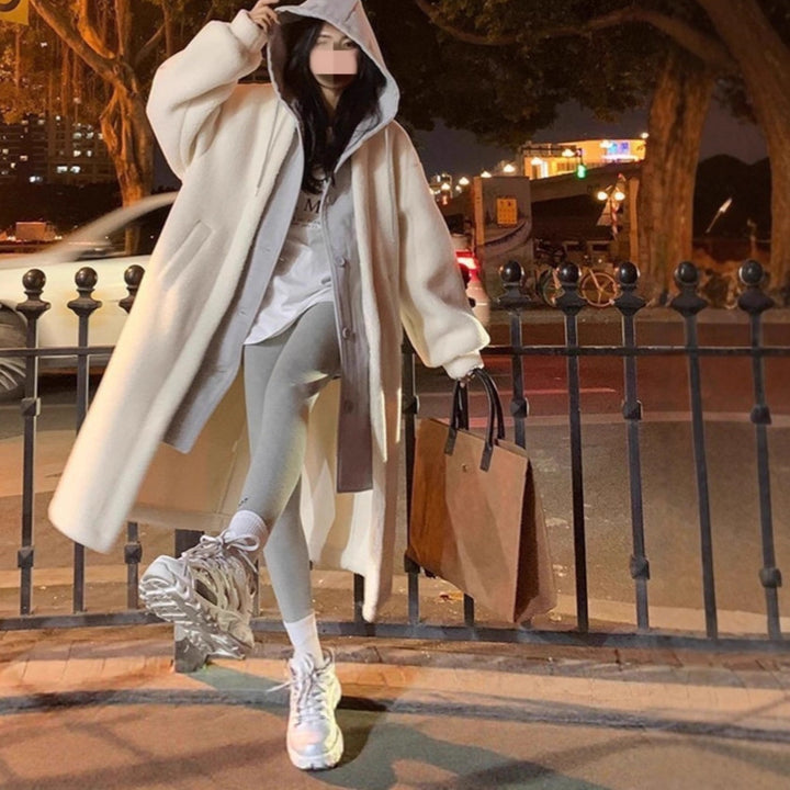 Long lamb fleece coat with hood, elegant