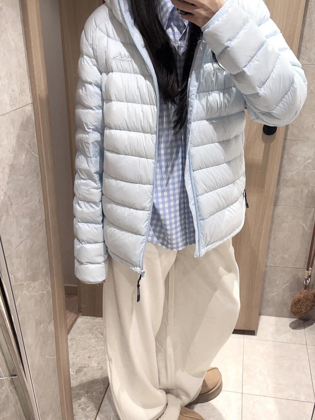 Light women's down jacket with hood