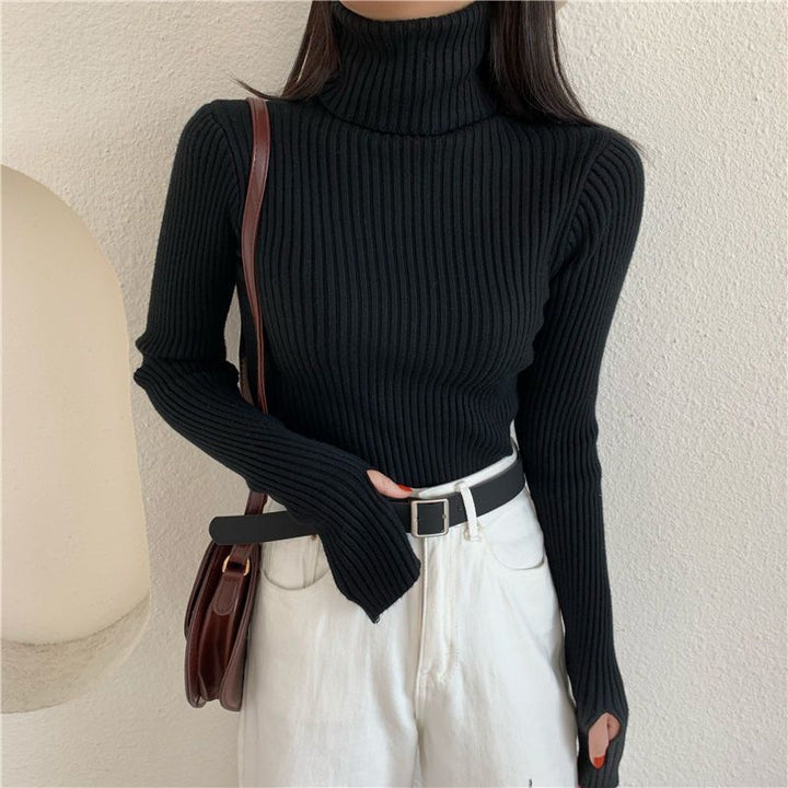 Figure-hugging turtleneck sweater with thumbholes