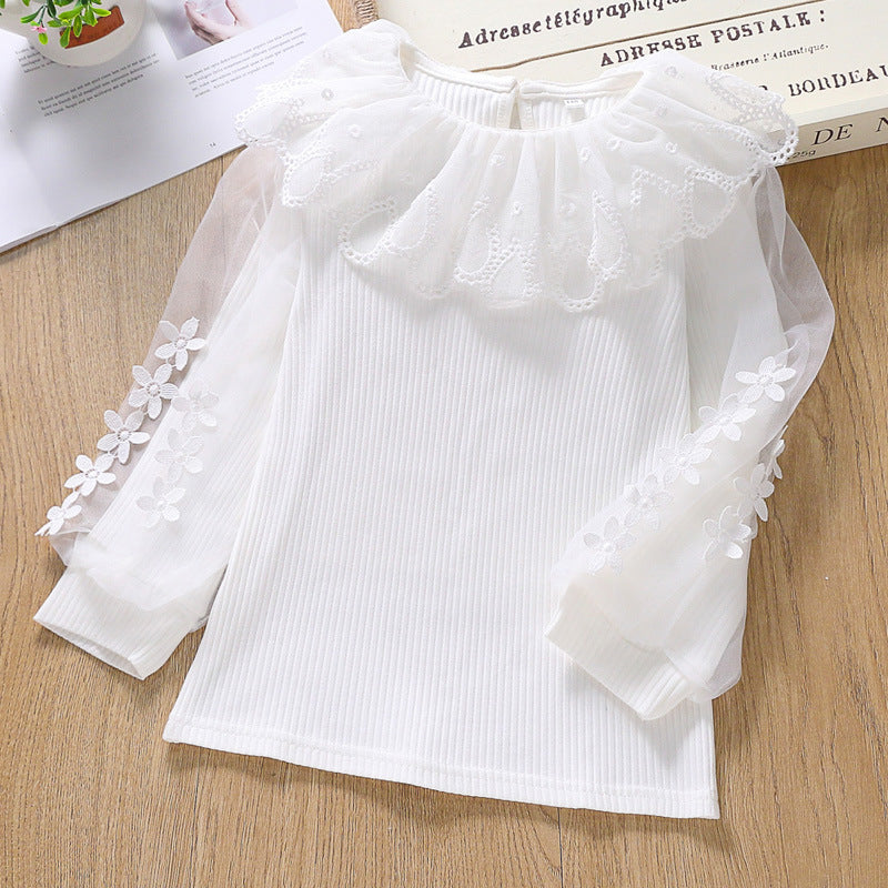 Girl's blouse with transparent puff sleeves and floral decoration Mune Fashion