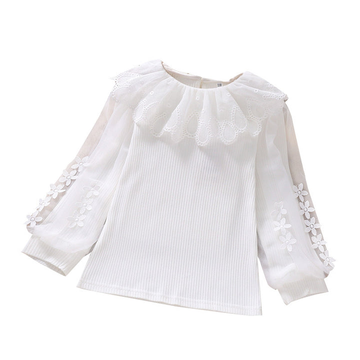 Girl's blouse with transparent puff sleeves and floral decoration Mune Fashion