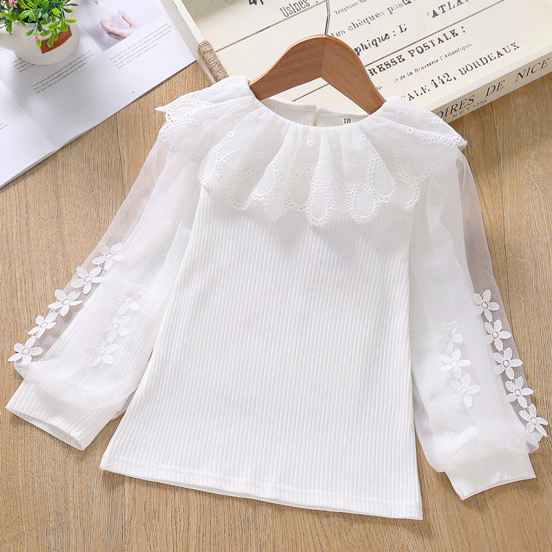 Girl's blouse with transparent puff sleeves and floral decoration Mune Fashion
