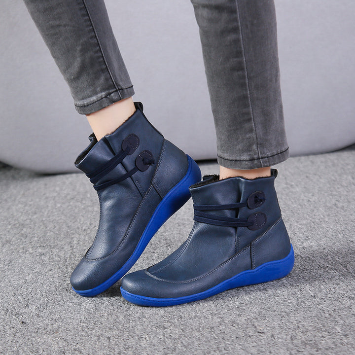 Women's faux-fur-lined ankle boot with ergonomic wedge sole, soft inner lining and decorative loops Mune Fashion