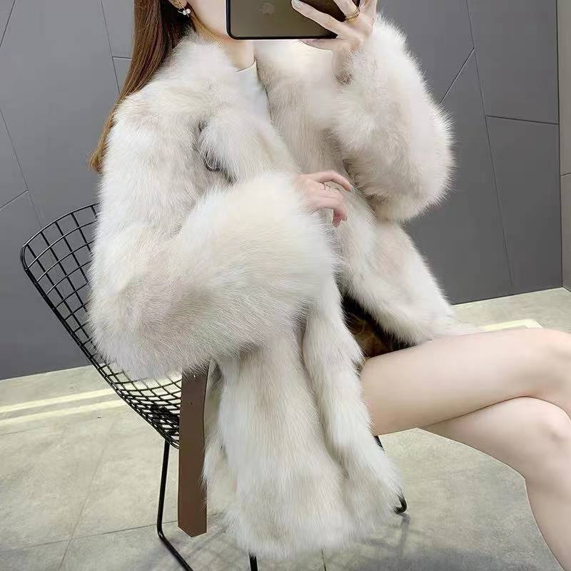 Elegant faux fur coat in fox look