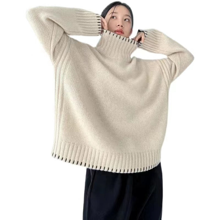 Women's knit sweater with cable pattern and turtleneck
