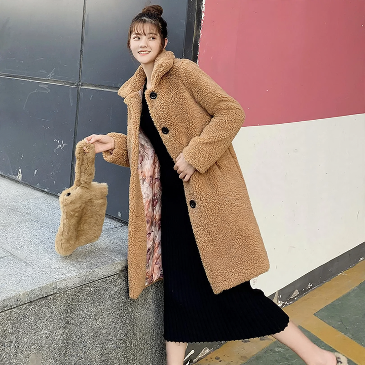 Women's coat made of sheared lambskin with stand-up collar