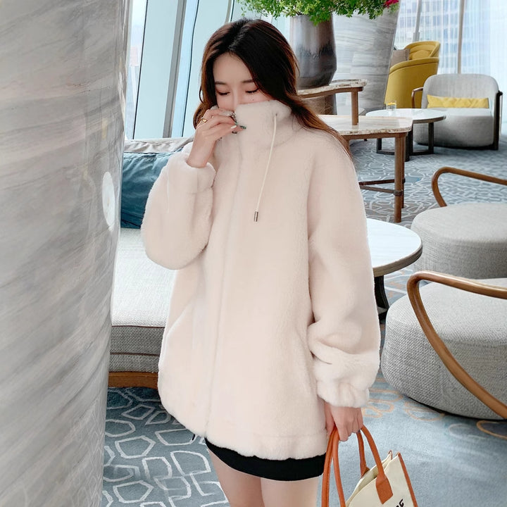 Padded coat made of lambskin imitation